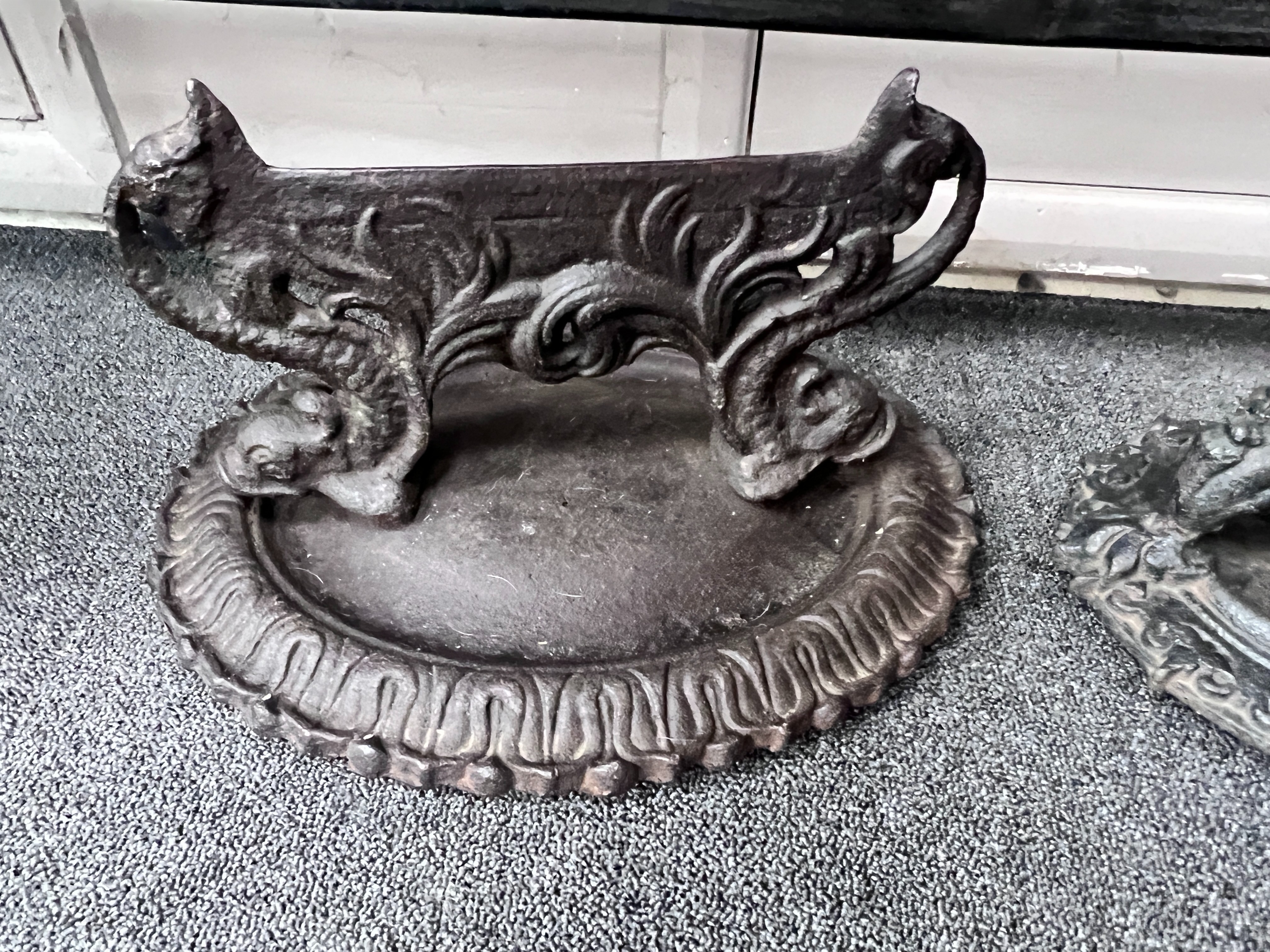 Two Victorian cast iron boot scrapers